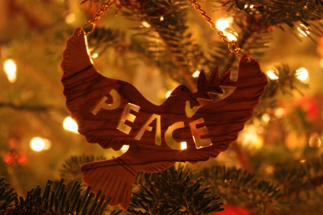 this beautiful ornament is made of Olive wood, carved by  artisans working for a peace organization in Palestine - a place that could use a sacred pause, don't you think?
